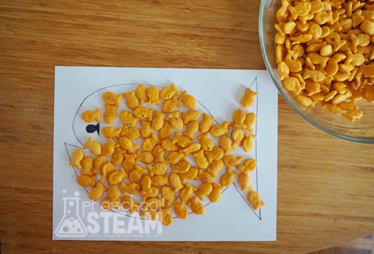 make a fish with goldfish crackers 